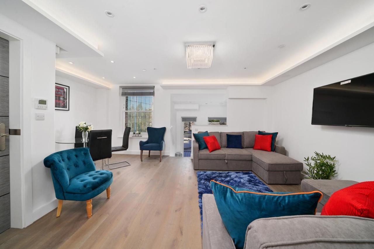 لندن City Prime Apartments المظهر الخارجي الصورة A living room in a serviced apartment in London