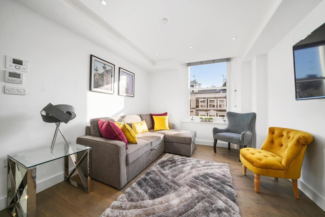 لندن City Prime Apartments المظهر الخارجي الصورة A living room in a serviced apartment in London