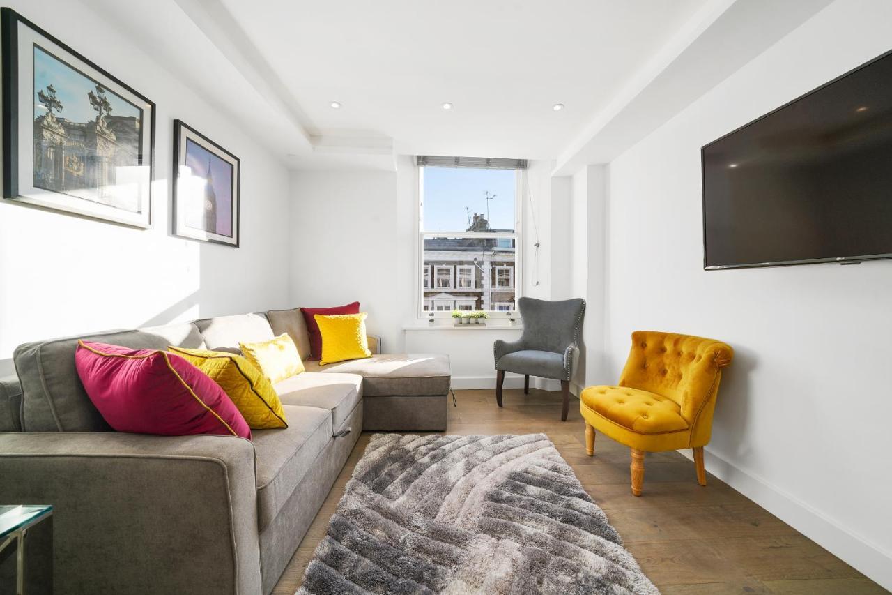 لندن City Prime Apartments المظهر الخارجي الصورة A living room in a serviced apartment in London