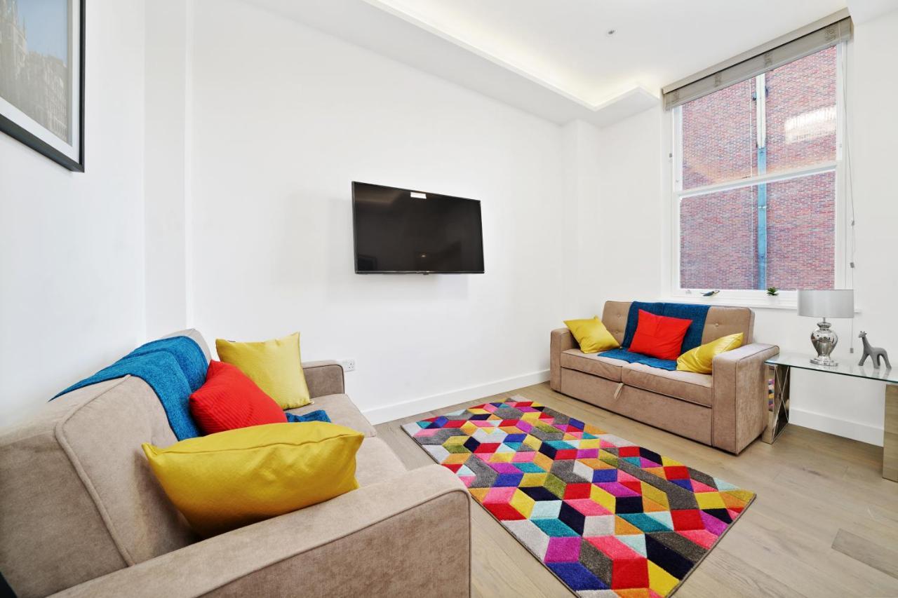 لندن City Prime Apartments المظهر الخارجي الصورة A living room in a serviced apartment in London