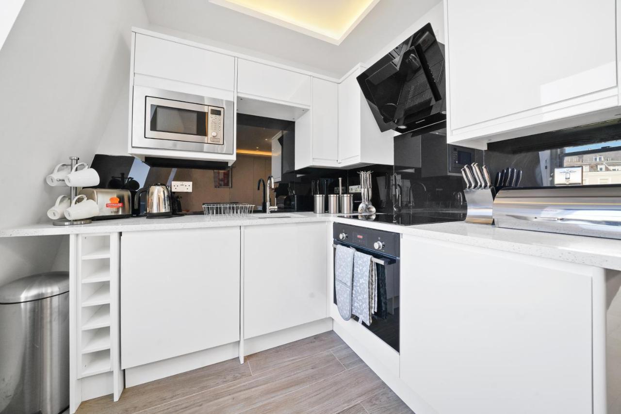 لندن City Prime Apartments المظهر الخارجي الصورة A modern kitchen